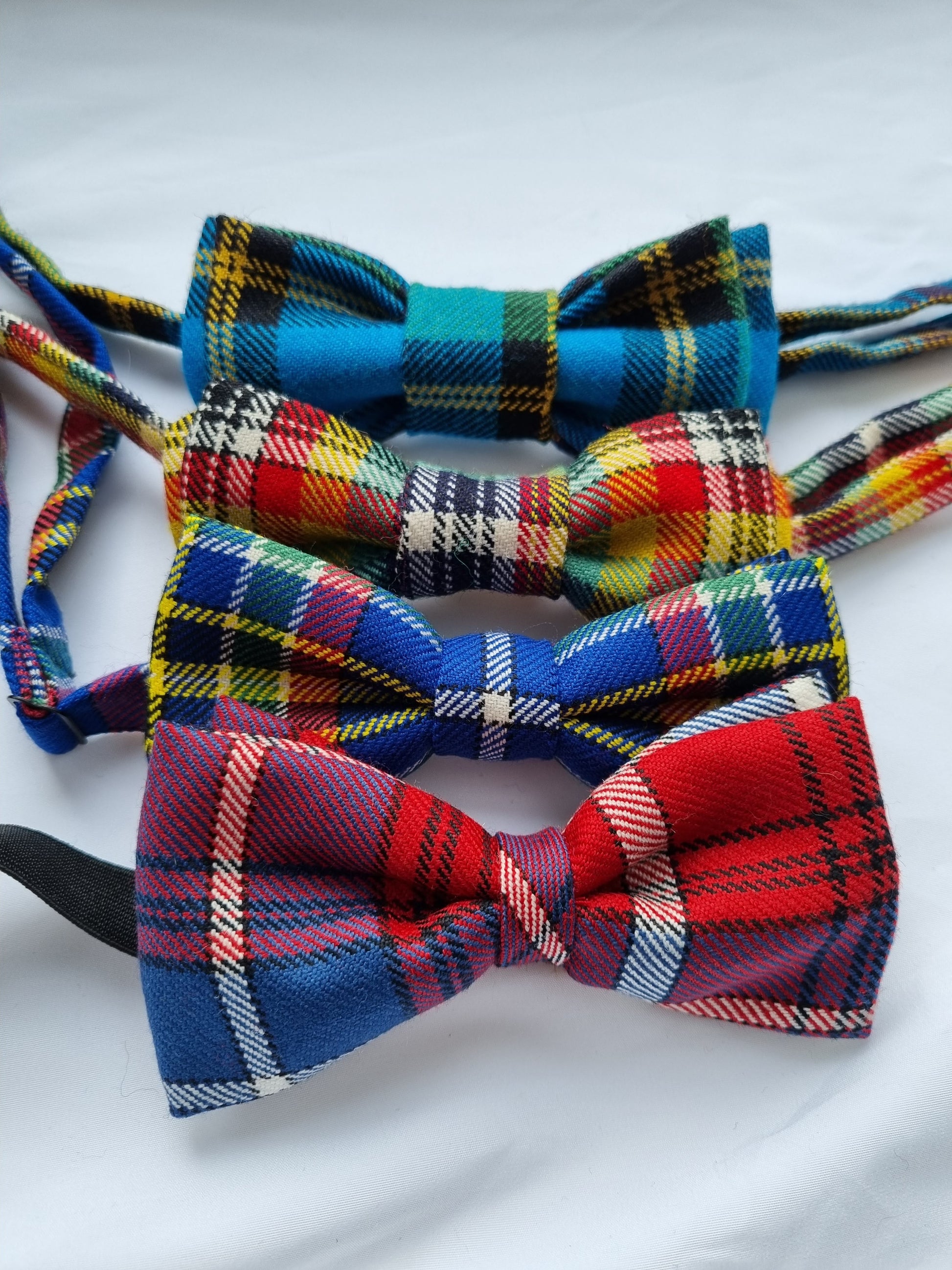 Four colourful handmade tartan bow ties