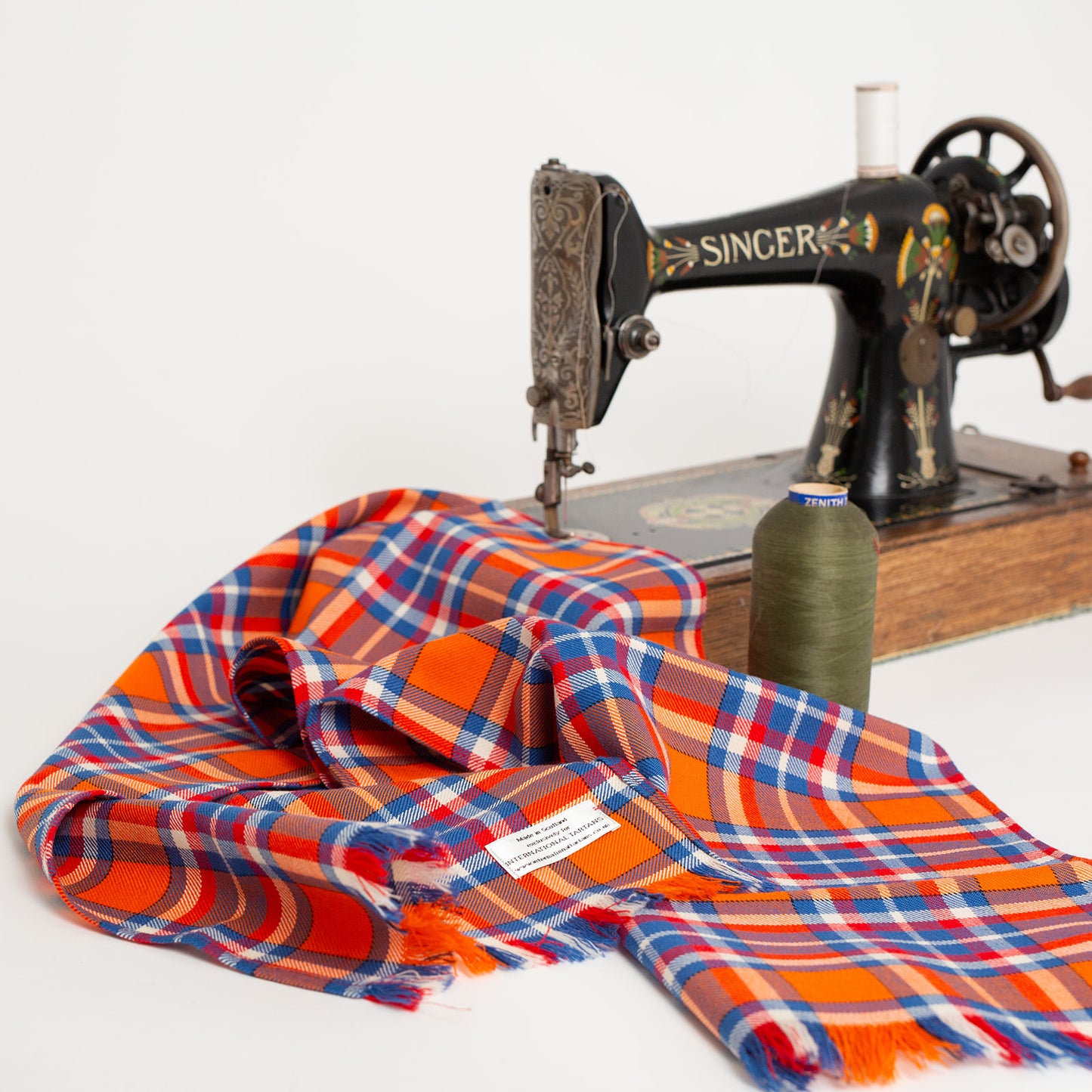 Netherlands tartan with sewing machine and spool of thread
