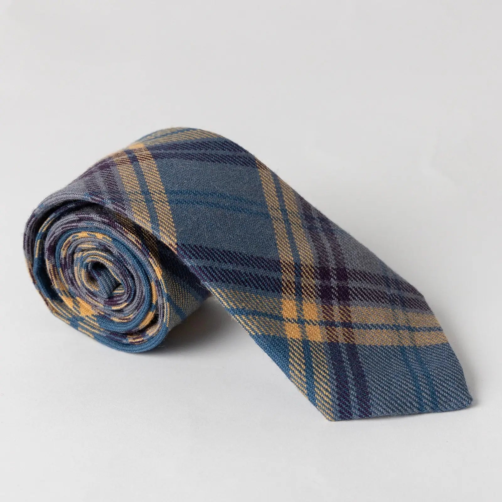 Handmade Dunn tartan tie in blue, purple and yellow