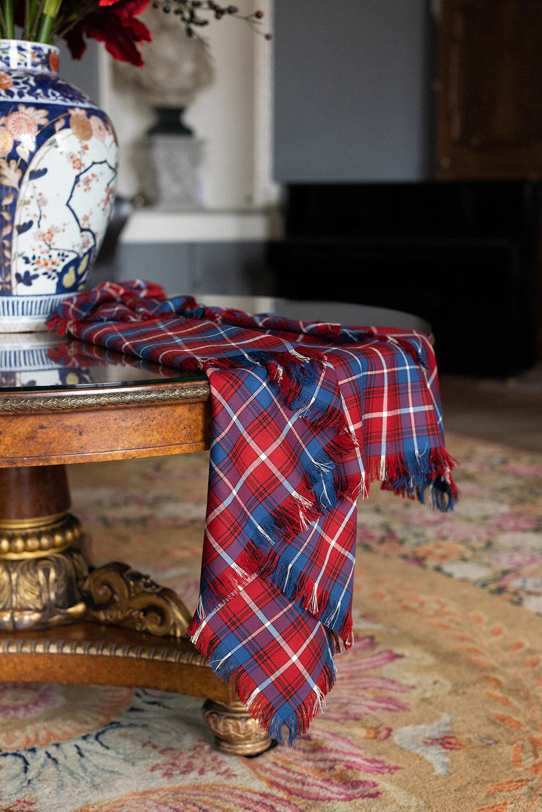 tartan shawl draped over a table handmade 