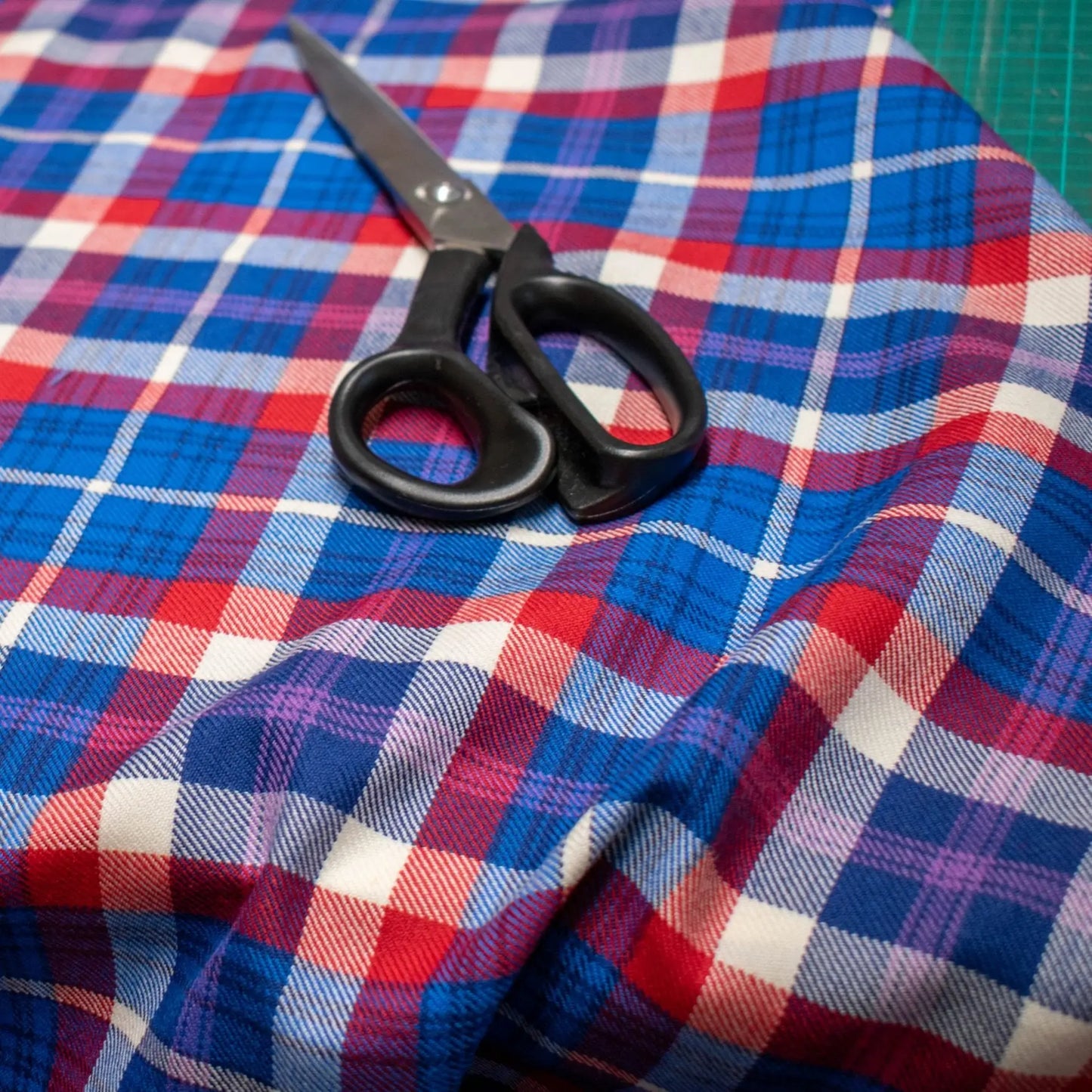 Auld Alliance tartan fabric with scissors