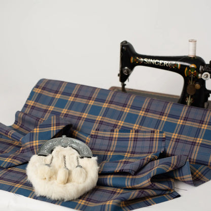 Dunn tartan with vintage sewing machine and sporran