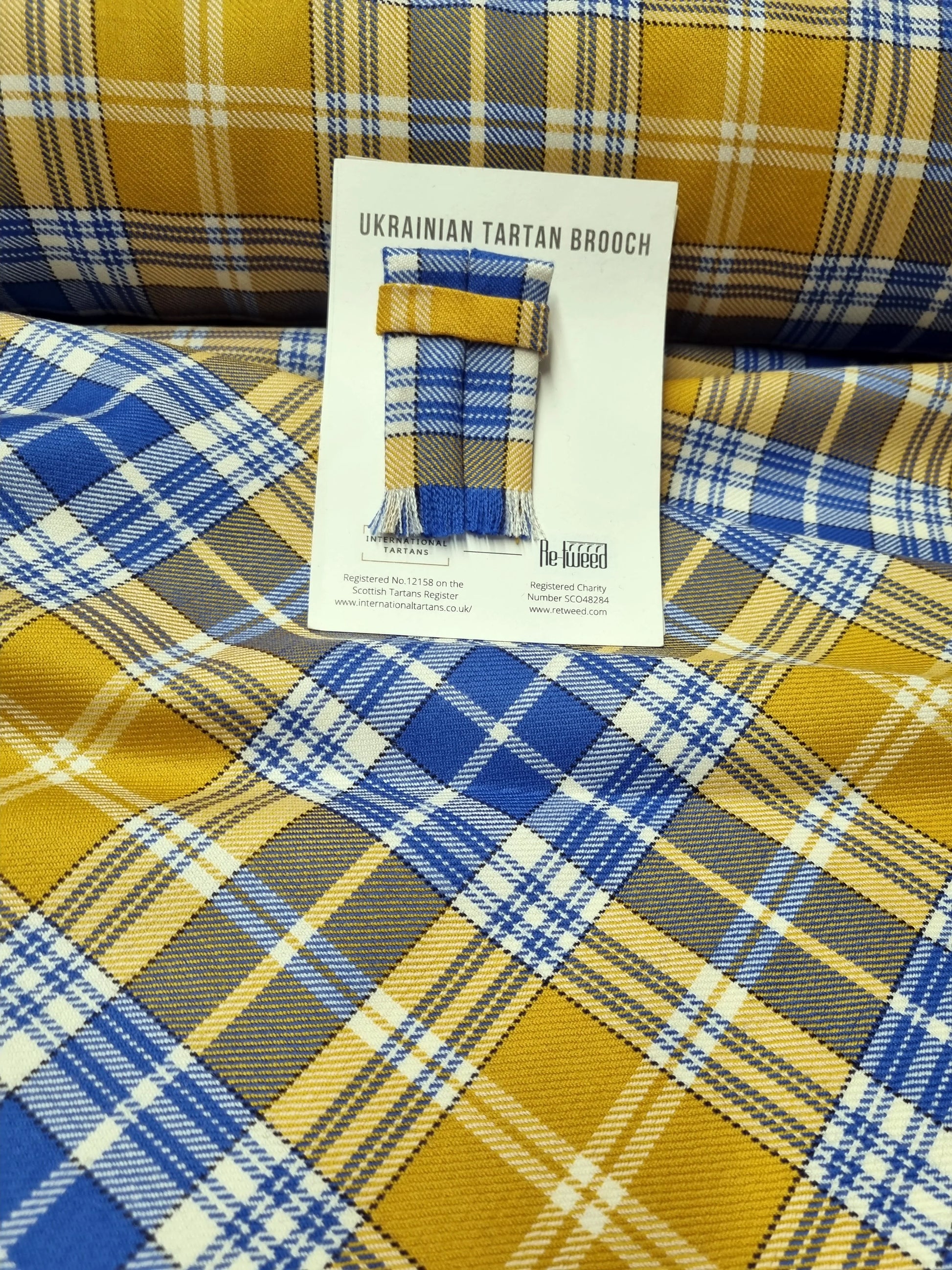 Ukraine tartan fabric and brooch